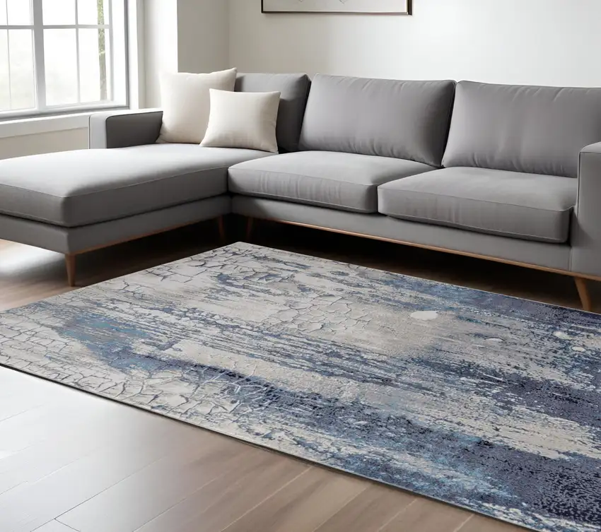 Ivory Blue And Black Abstract Power Loom Distressed Area Rug Photo 1
