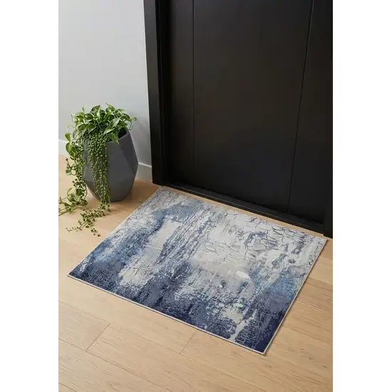 Ivory Blue And Black Abstract Power Loom Distressed Area Rug Photo 1