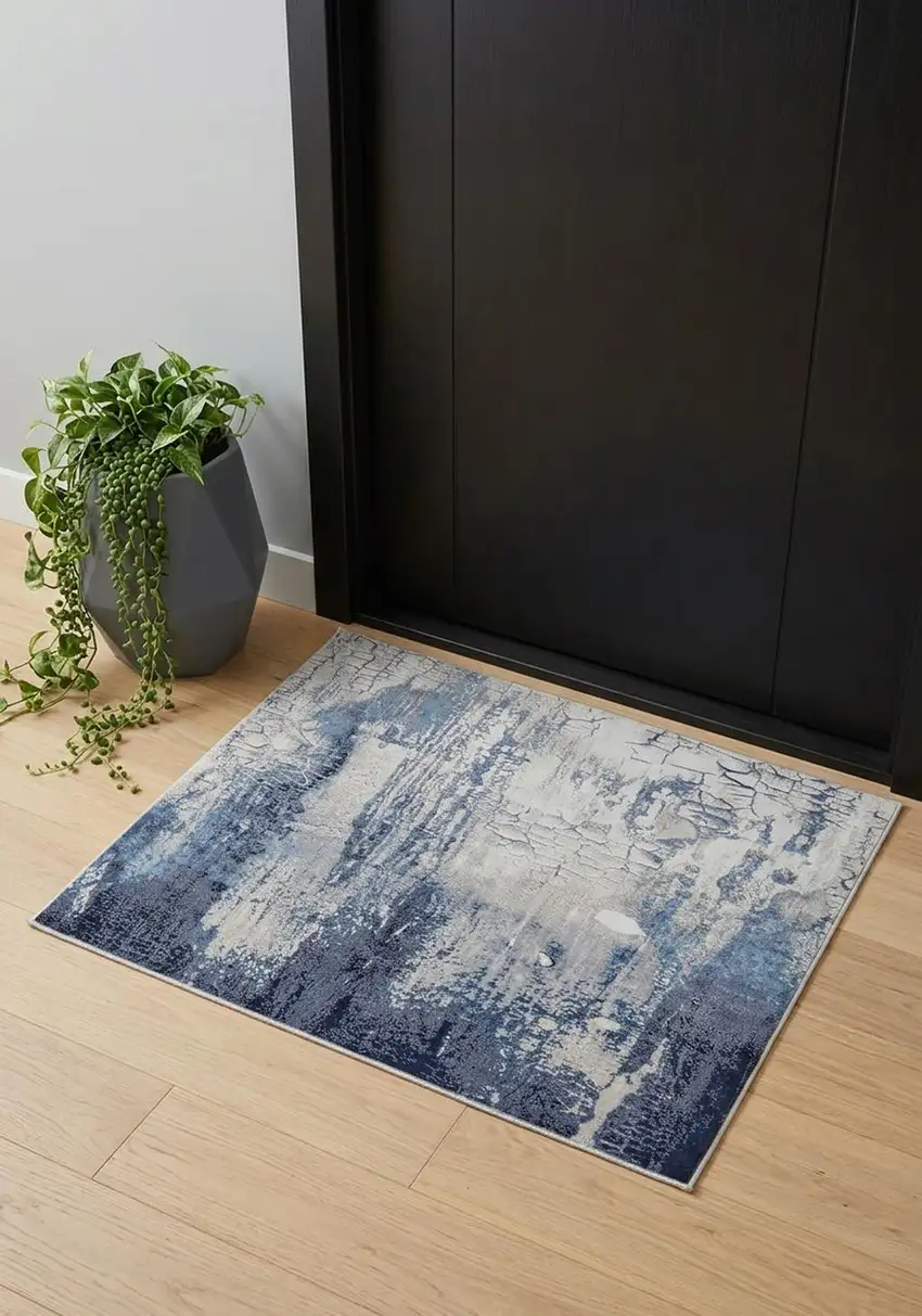 Ivory Blue And Black Abstract Power Loom Distressed Area Rug Photo 1