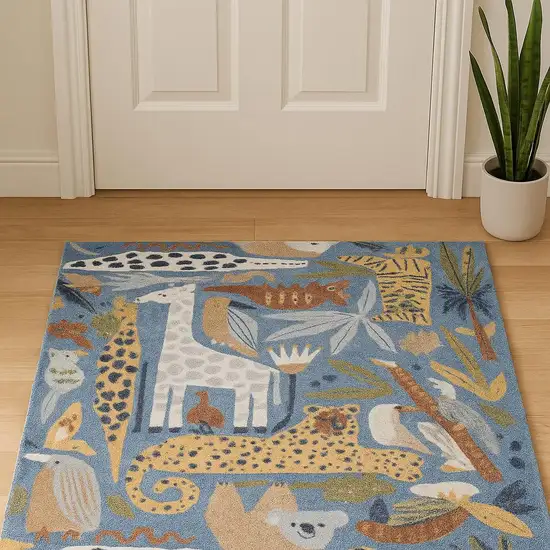 Ivory Blue And Brown Animal Print Area Rug Photo 1