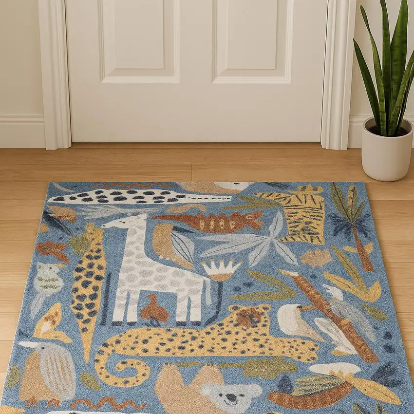 Ivory Blue And Brown Animal Print Area Rug Photo 1