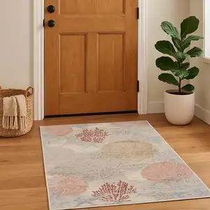 Photo of Ivory Blue And Brown Area Rug