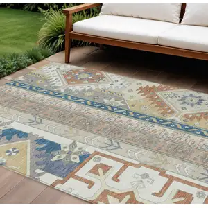 Photo of Ivory Blue And Brown Aztec Washable Indoor Outdoor Area Rug