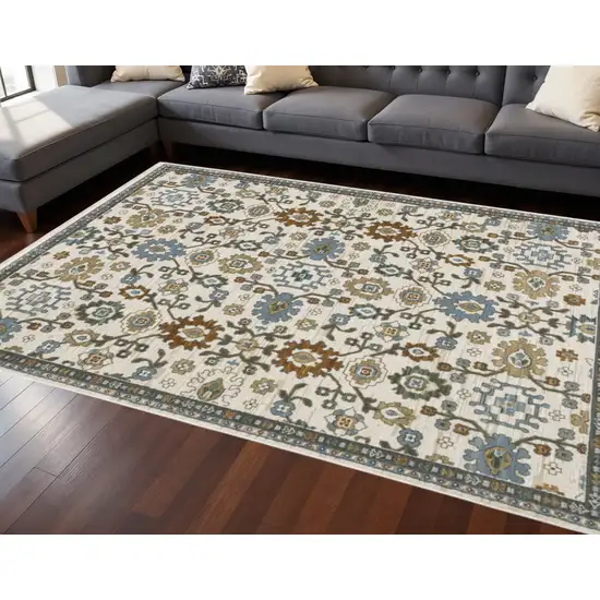 Ivory Blue And Brown Floral Area Rug With Fringe Photo 1