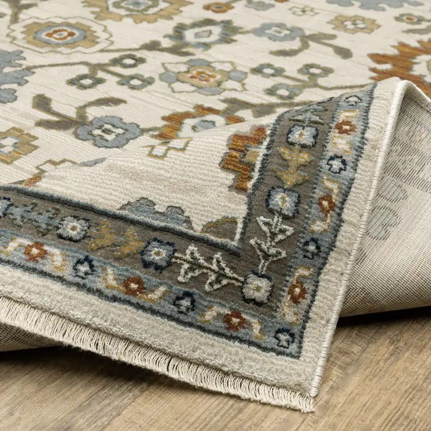 Ivory Blue And Brown Floral Area Rug With Fringe Photo 9