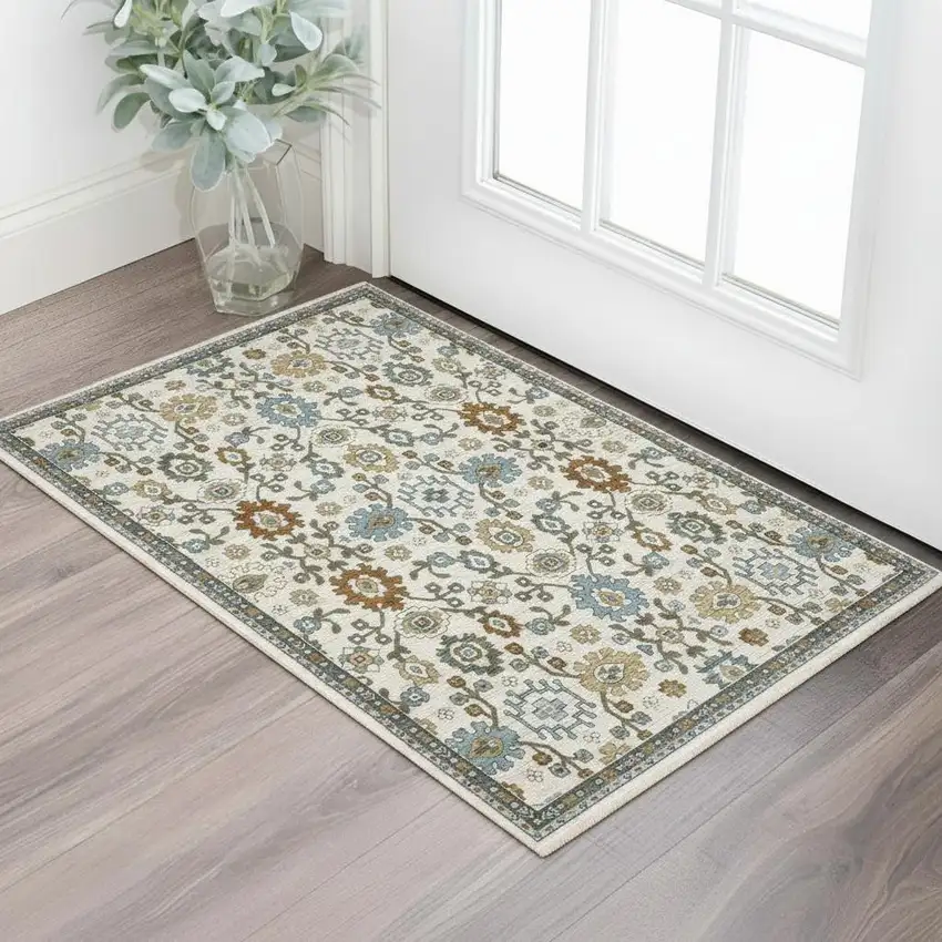 Ivory Blue And Brown Floral Area Rug With Fringe Photo 1