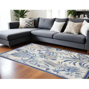 Photo of Ivory Blue And Brown Floral Area Rug