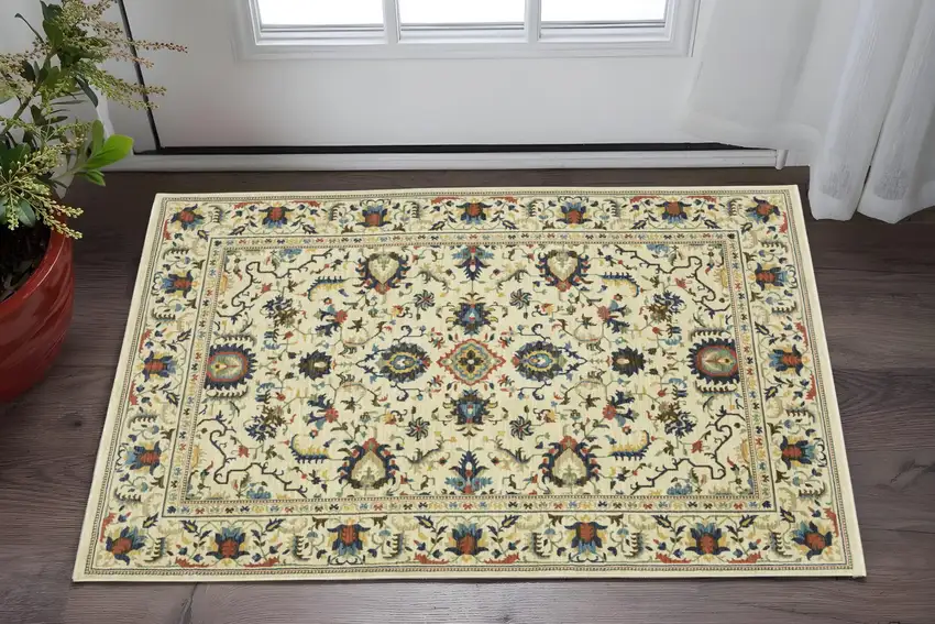 Ivory Blue And Brown Oriental Area Rug With Fringe Photo 1