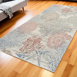 Photo of Ivory Blue And Brown Seashell and Coral Area Rug