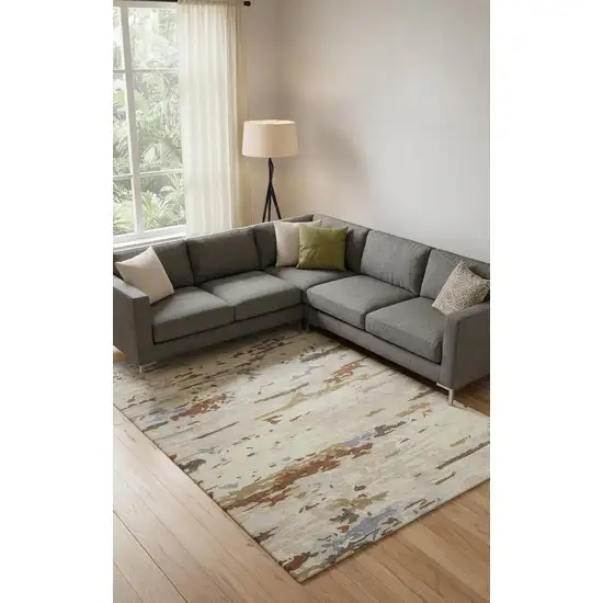 Ivory Blue And Brown Wool Abstract Tufted Handmade Stain Resistant Area Rug Photo 1