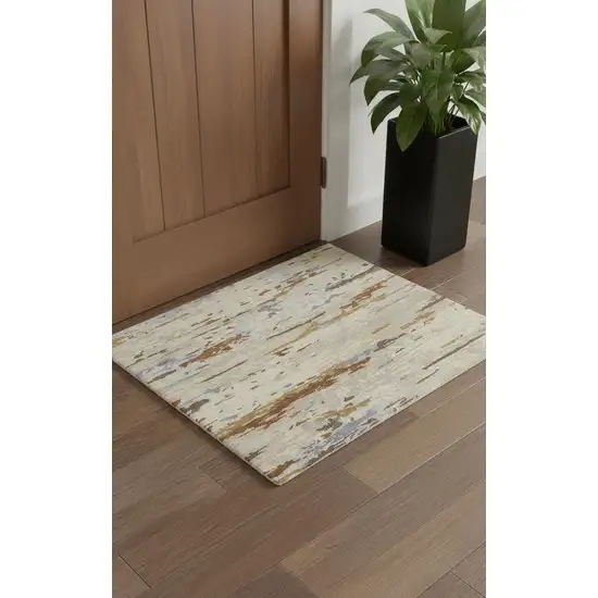 Ivory Blue And Brown Wool Abstract Tufted Handmade Stain Resistant Area Rug Photo 1