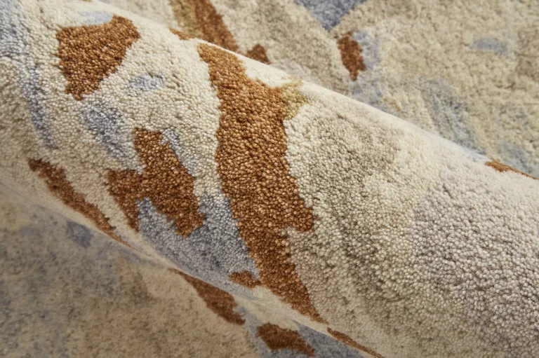 Ivory Blue And Brown Wool Abstract Tufted Handmade Stain Resistant Area Rug Photo 1