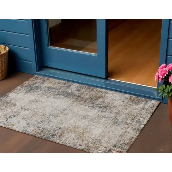 Ivory Blue And Copper Abstract Washable Indoor Outdoor Area Rug Photo 1