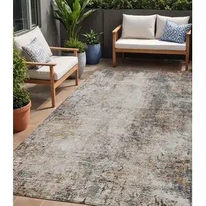 Photo of Ivory Blue And Copper Abstract Washable Indoor Outdoor Area Rug