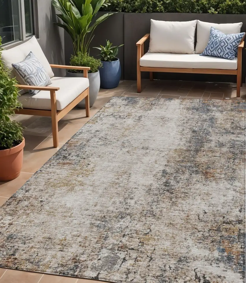 Ivory Blue And Copper Abstract Washable Indoor Outdoor Area Rug Photo 1