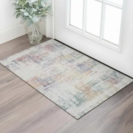 Ivory Blue And Gold Abstract Washable Area Rug With UV Protection Photo 1