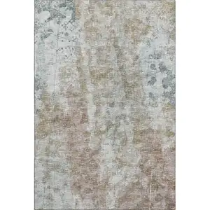 Photo of Ivory Blue And Gold Abstract Washable Indoor Outdoor Area Rug