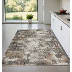 Photo of Ivory Blue And Gray Abstract Area Rug