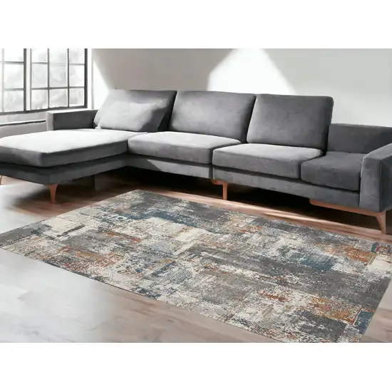 Ivory Blue And Gray Abstract Area Rug Photo 1