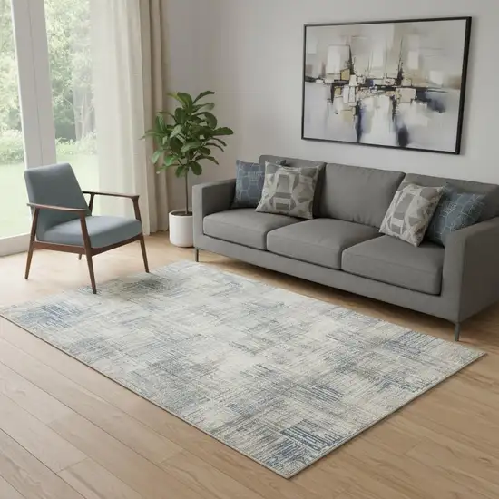 Ivory Blue And Gray Abstract Distressed Area Rug Photo 1