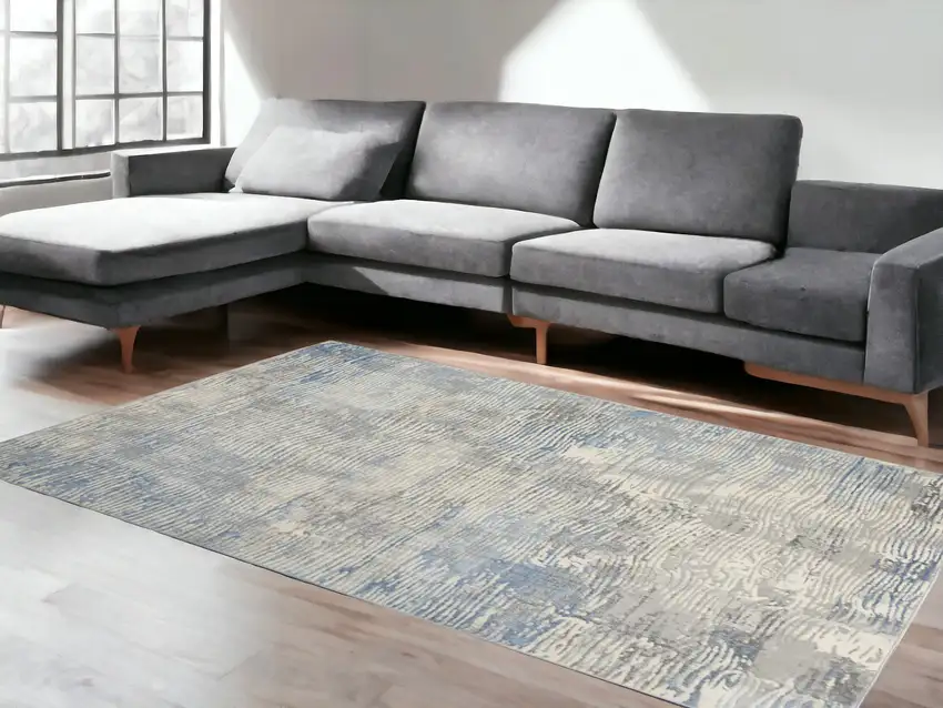 Ivory Blue And Gray Abstract Distressed Area Rug Photo 1