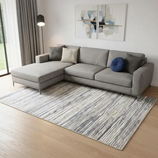 Ivory Blue And Gray Abstract Distressed Area Rug Photo 1