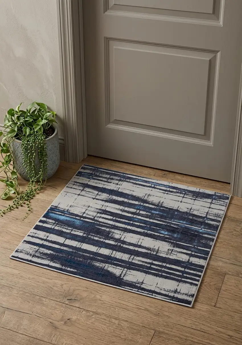 Ivory Blue And Gray Abstract Power Loom Distressed Area Rug Photo 1