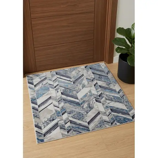 Ivory Blue And Gray Chevron Power Loom Distressed Area Rug Photo 1