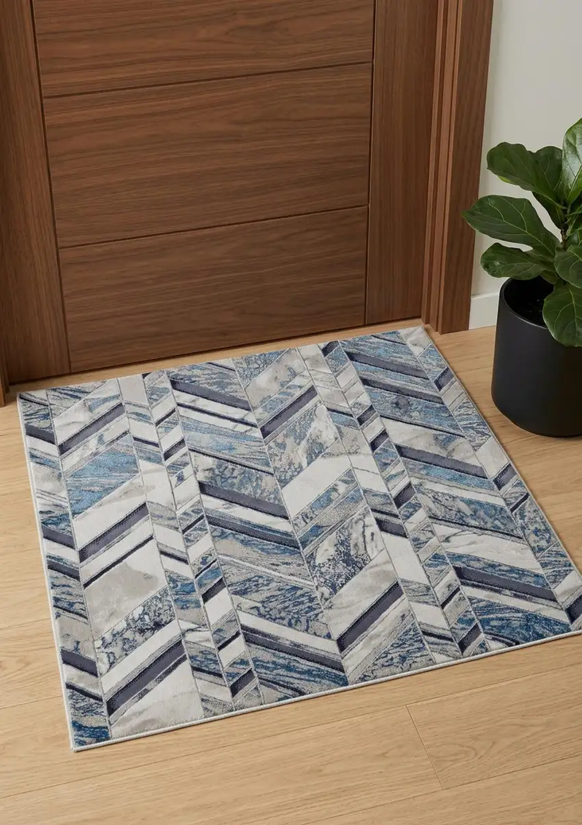 Ivory Blue And Gray Chevron Power Loom Distressed Area Rug Photo 1