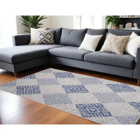 Ivory Blue And Gray Geometric Distressed Area Rug Photo 1