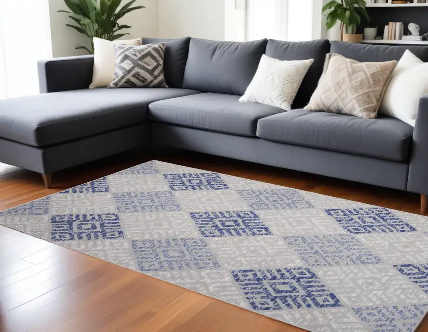 Ivory Blue And Gray Geometric Distressed Area Rug Photo 1