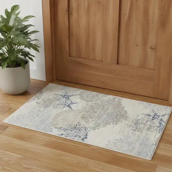 Ivory Blue And Gray Seashell and Coral Non Skid Area Rug Photo 1
