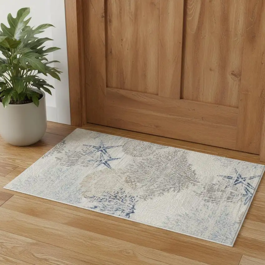 Ivory Blue And Gray Seashell and Coral Non Skid Area Rug Photo 1