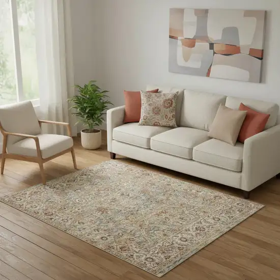 Ivory Blue And Orange Floral Distressed Area Rug Photo 1