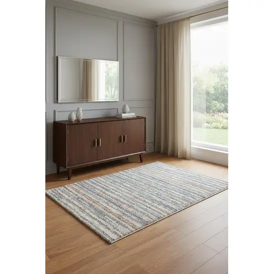Ivory Blue And Orange Striped Power Loom Stain Resistant Area Rug Photo 1