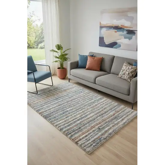 Ivory Blue And Orange Striped Power Loom Stain Resistant Area Rug Photo 1