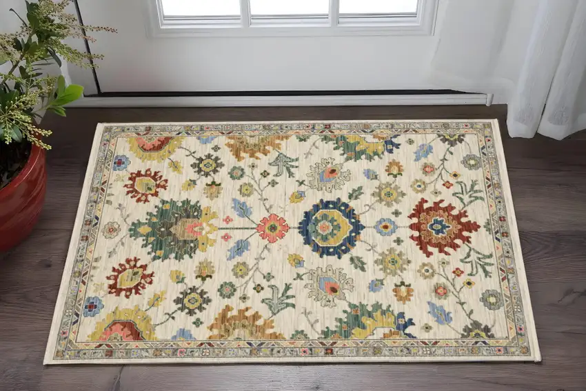 Ivory Blue And Red Oriental Area Rug With Fringe Photo 1