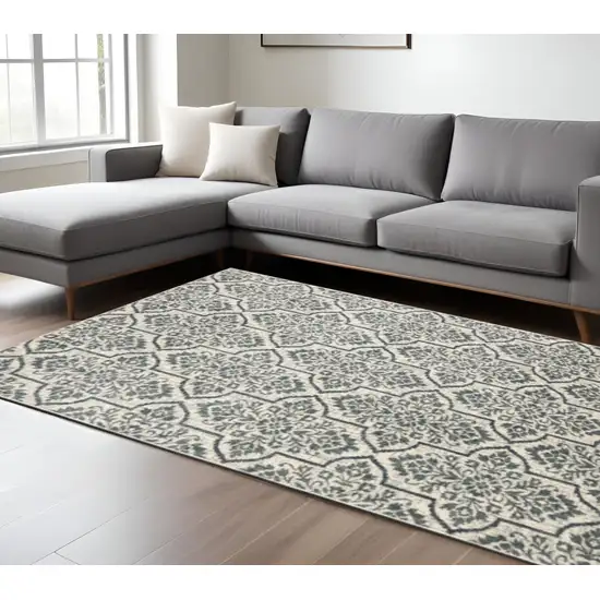 Ivory Blue And Sage Floral Power Loom Stain Resistant Area Rug Photo 1
