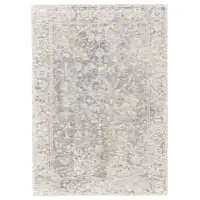 Photo of Ivory Blue And Tan Abstract Hand Woven Area Rug