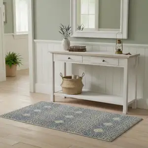 Photo of Ivory Blue And Tan Floral Area Rug