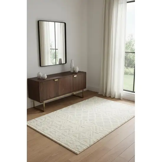 Ivory Blue And Tan Wool Geometric Tufted Handmade Stain Resistant Area Rug Photo 1