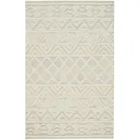 Photo of Ivory Blue And Tan Wool Geometric Tufted Handmade Stain Resistant Area Rug