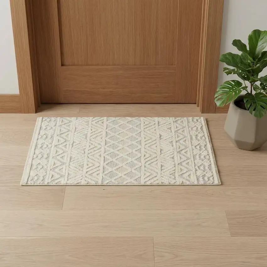 Ivory Blue And Tan Wool Geometric Tufted Handmade Stain Resistant Area Rug Photo 1
