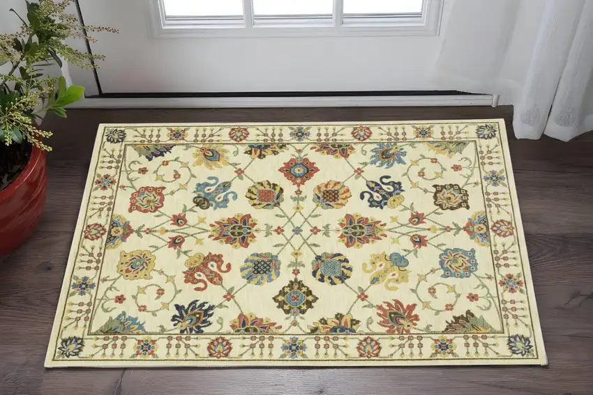 Ivory Blue And Yellow Oriental Area Rug With Fringe Photo 1