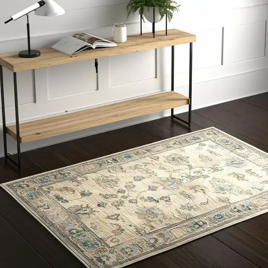 Ivory Blue Gold And Grey Oriental Power Loom Stain Resistant Area Rug Photo 1