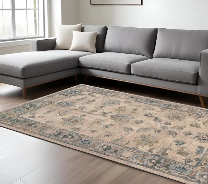 Ivory and Blue Oriental Power Loom Area Rug Photo 1