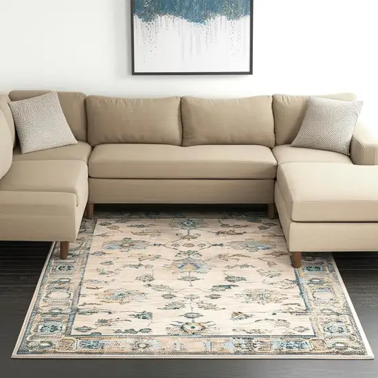 Ivory Blue Gold And Grey Oriental Power Loom Stain Resistant Area Rug Photo 1