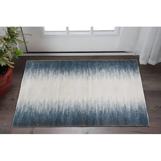 Ivory And Blue Abstract Area Rug Photo 1