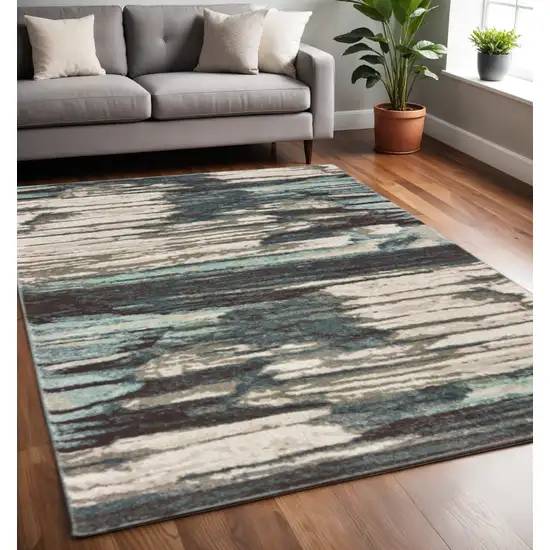 Ivory Blue And Gray Abstract Area Rug Photo 1