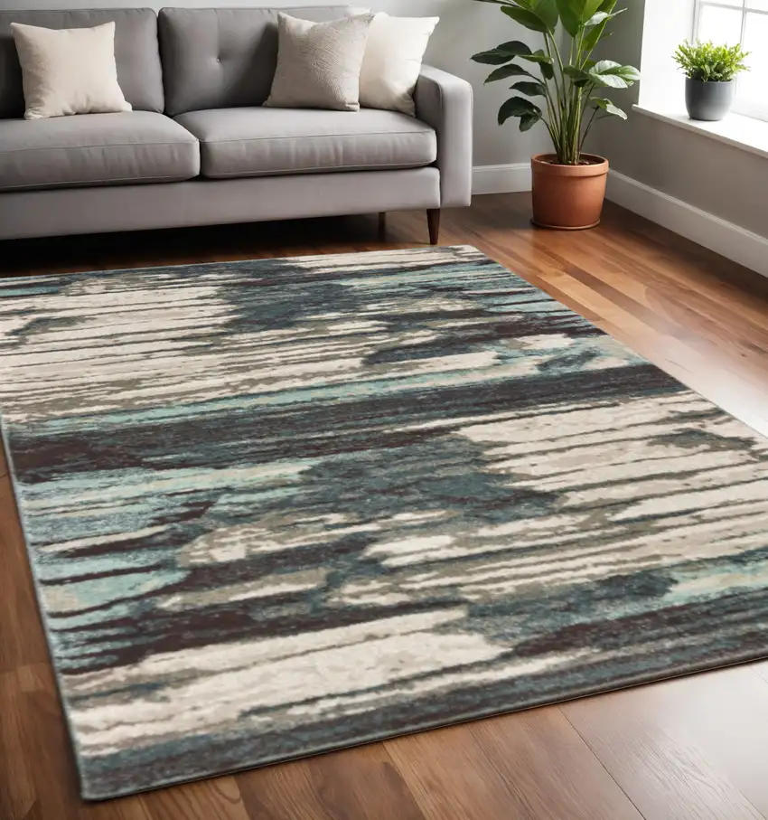 Ivory Blue And Gray Abstract Area Rug Photo 1